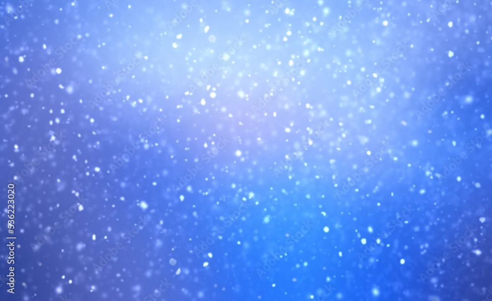 Fluffy snow flakes falls on blue sapphire color empty background. Blur effect. Wonderful winter natural textured backdrop.