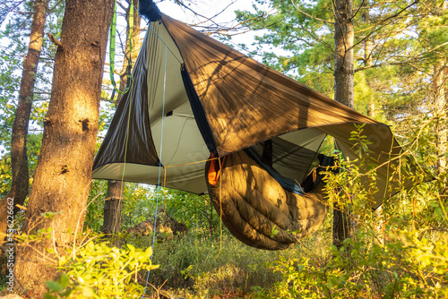 Photos Ultralight hammock and quilt  sleep system set up under a shaped tarp in Killarney Provincial Park