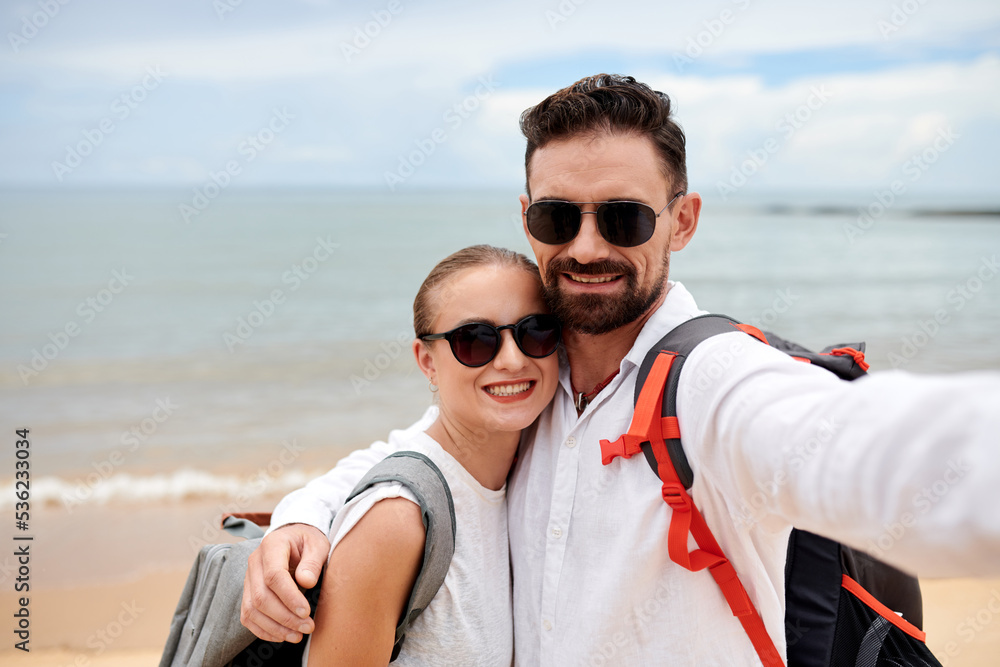 Selfie portrait of young couple of tourists