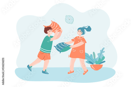 Smiling children having pillow fight. Cute cartoon characters fighting with pillows and having fun time together flat vector illustration. Childhood, friendship concept for banner or website design
