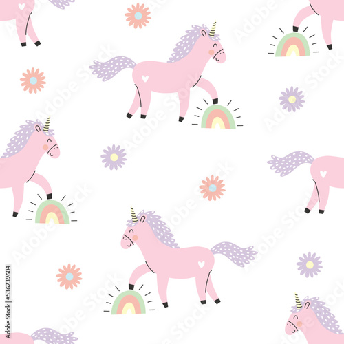 Seamless pattern with cute pink unicorn, rainbow and flowers. Vector illustration