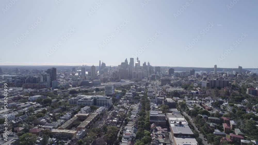 Sydney Cityscape In A Distance From Redfern In New South Wales, Australia. aerial pullback Sydney Cityscape In A Distance From Redfern In New South Wales, Australia. aerial pullback