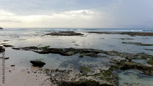 Wallpaper Mural Majestic view of Bali island coastline with crashing waves in horizon, low altitude aerial view Torontodigital.ca