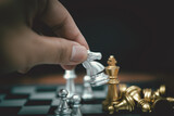 Strategy and business planning ideas. Chess horse silver on the board.