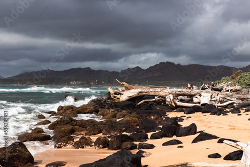 Stormy clouds over Wailua Beach in Kauai, Hawaii photo