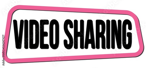 VIDEO SHARING text on pink-black trapeze stamp sign.