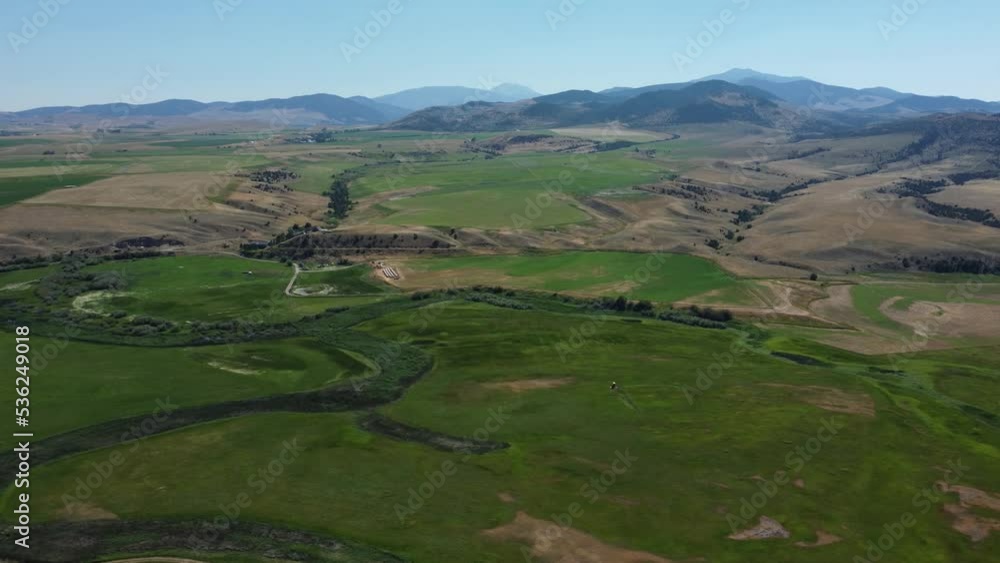 Drone shot of the green fields in Montana in summertime Drone shot of the green fields in Montana in summertime