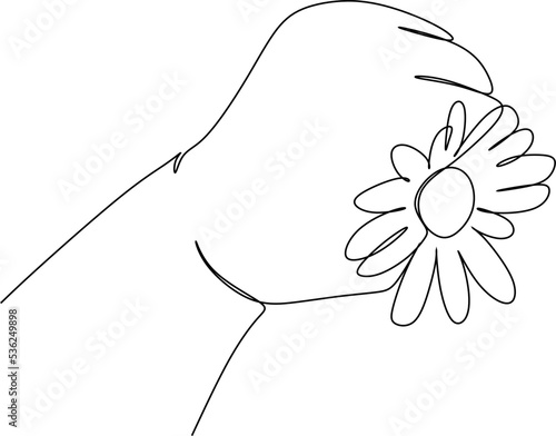 Continuous line of a child's hand. Flowers in a small hand.