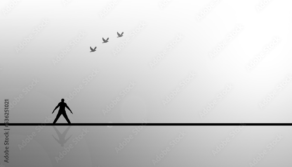 Shot of a single man on the edge with some birds in black and white image. Man in his imaginary world. Conceptual Image. Modern Loneliness. Shot of a single man on the edge with some birds in black and white image. Man in his imaginary world. Conceptual Image. Modern Loneliness.