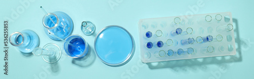 Concept of science and research with laboratory accessories, top view