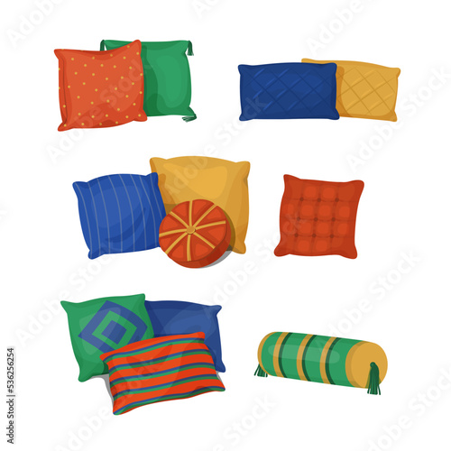 Set of bed pillows of different shapes and sizes.