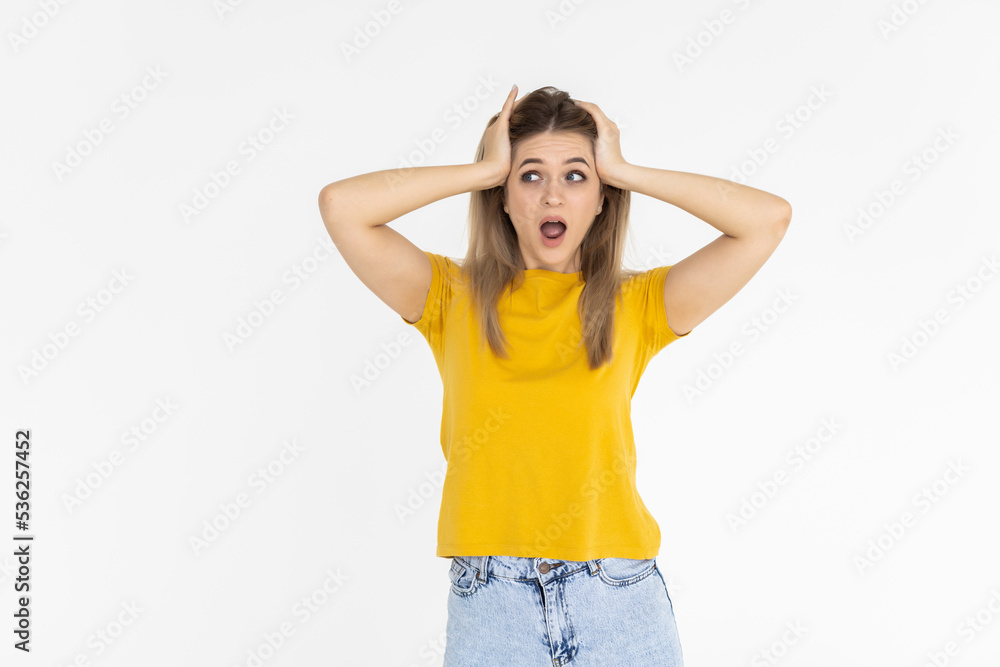 Surprised happy beautiful woman looking sideways in excitement isolated on white background Surprised happy beautiful woman looking sideways in excitement isolated on white background