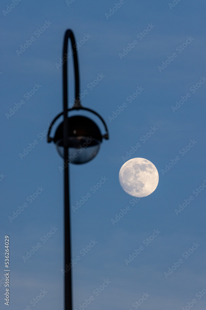 Full moon in front of a lamp post Full moon in front of a lamp post
