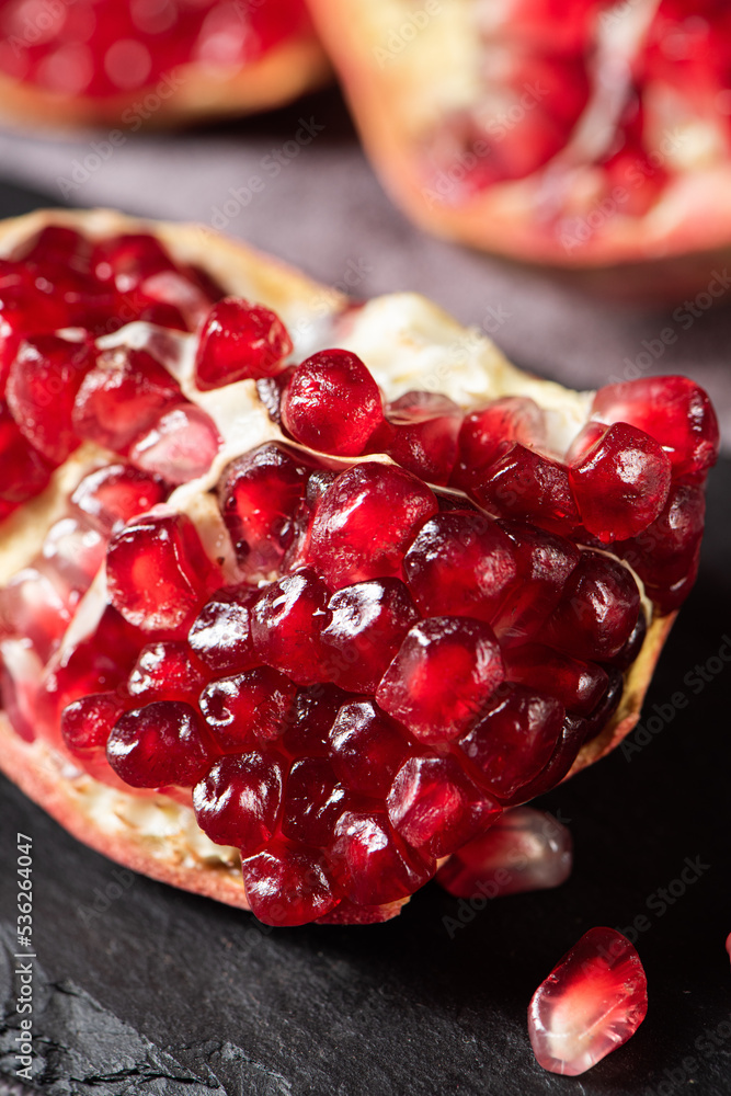 ripe red pomegranate fruit on table ripe red pomegranate fruit on table