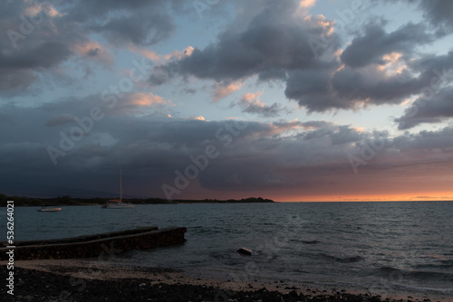 Pier in Anaehoomalu Bay under sunset