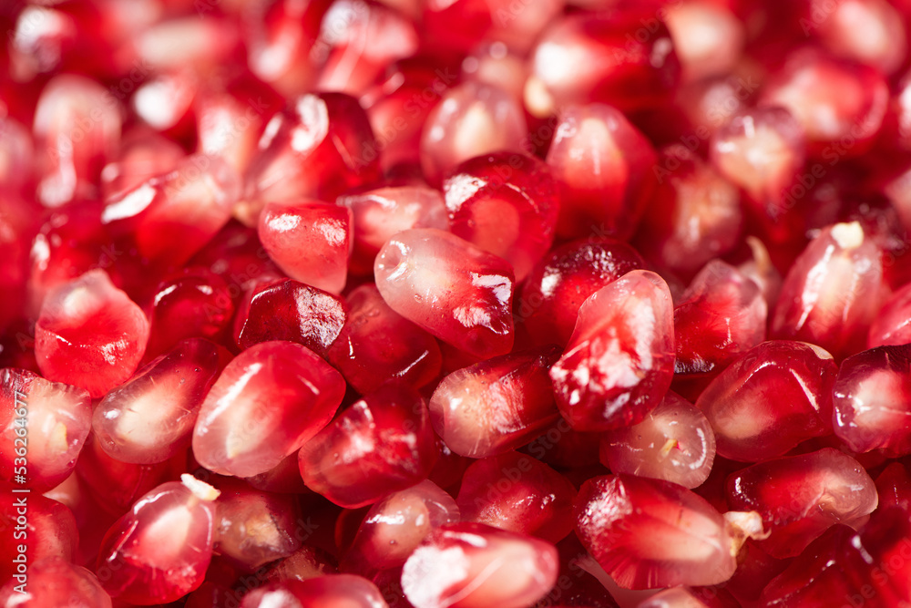 closeup of pomegranate seeds background texture. closeup of pomegranate seeds background texture.