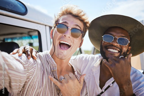 Friends, travel and selfie by men on a road trip adventure in summer, relax and bonding in nature. Freedom, fun and diverse people smile and pose for photo, cheerful and happy in the countryside © S Fanti/peopleimages.com