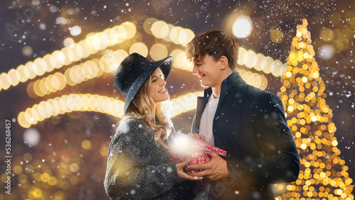  Couple outdoor in winter.  christmas - a couple celebrates together at the christmas market photo