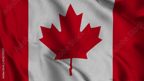 Canadian flag, waving in the wind and with a country map in the Canadian flag pattern. It is a composite garden of Footage.