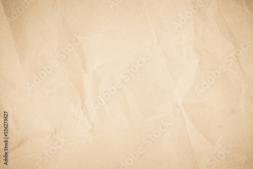 Brown recycled kraft paper crumpled vintage texture background for letter. Abstract parchment old retro page grunge blank newspaper. Cream pattern rough crease grunge surface backdrop.