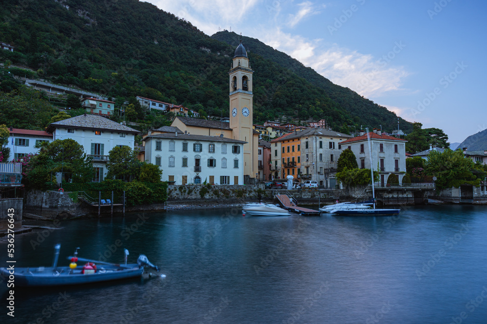 The town of Laglio, on Lake Como, with the last lights of the sun of a summer day - July 2022.