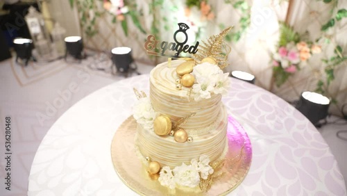 Engagement Cake camera pan left to right slow motion shot 