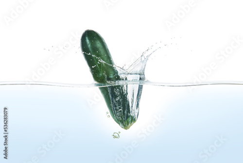 Zuchini splashing in water.