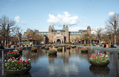 Rijksmuseum with Tulips Flowers in The Netherlands Amsterdam Holland photo