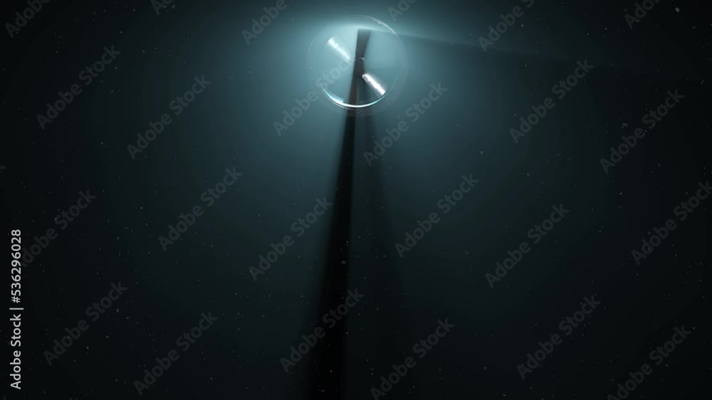 Fan Visual Effects A large fan on top of the screen with volumetric light beams passing ...
