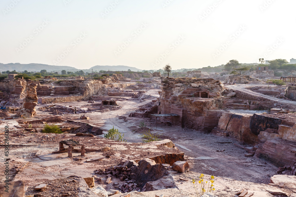 Stone quarry with red stones in Rajasthan, India, Asia