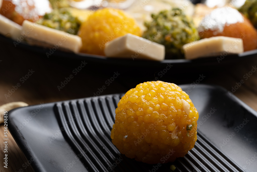 Indian Sweet Motichoor laddoo Also Know as Bundi Laddu or Motichur Laddoo Are Made of Very Small Gram Flour Balls or Boondis Which Are Deep Fried Indian Sweet Motichoor laddoo Also Know as Bundi Laddu or Motichur Laddoo Are Made of Very Small Gram Flour Balls or Boondis Which Are Deep Fried