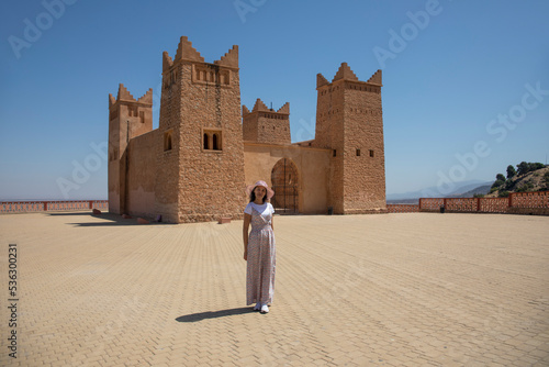 Tourist in the Kasbah of Beni Mellal which is a Berber castle and historical monument in the city of Beni Mellal, Morocco. This fortress is in the Tadla plain in the Middle Atlas. photo