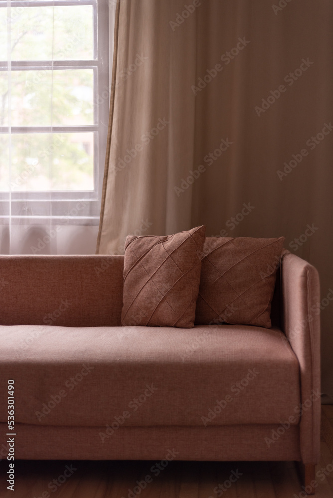 Fototapeta premium A modern, stylish and bright living room. Stylish scandinavian living room with design mint sofa