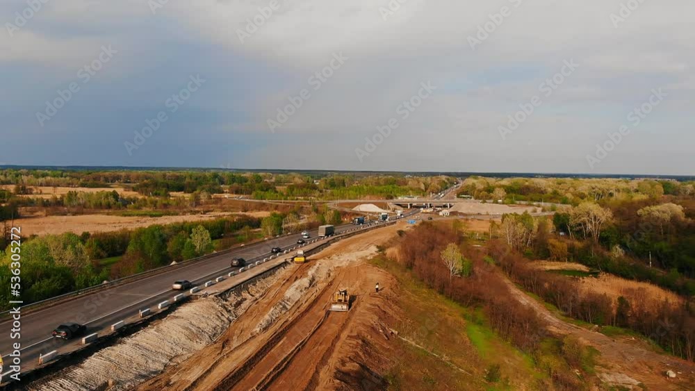 the work of construction equipment, the construction of a road in the city of Poltava, a route from Kyiv to Kharkov, 3 aprile 2020. the work of construction equipment, the construction of a road in the city of Poltava, a route from Kyiv to Kharkov, 3 aprile 2020.