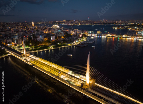 Fototapeta Naklejka Na Ścianę i Meble -  Halic Metro Bridge in the Sunset Drone Photo, Galata Beyoglu, Istanbul Turkey