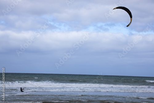 Kitesurfing in the Ocean waves