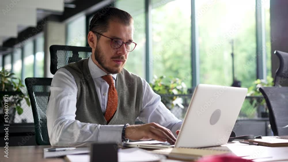 Stressed overwhelmed businessman working on laptop, suffering from eyes fatigue or having painful feelings. Exhausted executive manager overworked in office, burnout concept. Stressed overwhelmed businessman working on laptop, suffering from eyes fatigue or having painful feelings. Exhausted executive manager overworked in office, burnout concept.