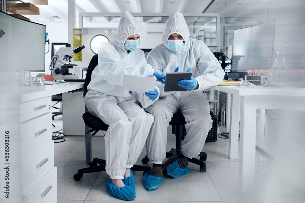 Scientist, covid and team planning research document in laboratory medical safety and protection corona virus results. Man and woman healthcare science doctors in covid 19 tech paperwork partnership Scientist, covid and team planning research document in laboratory medical safety and protection corona virus results. Man and woman healthcare science doctors in covid 19 tech paperwork partnership