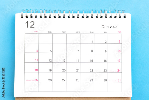 close-up of calendar december of november 2023 top view on a blue background photo