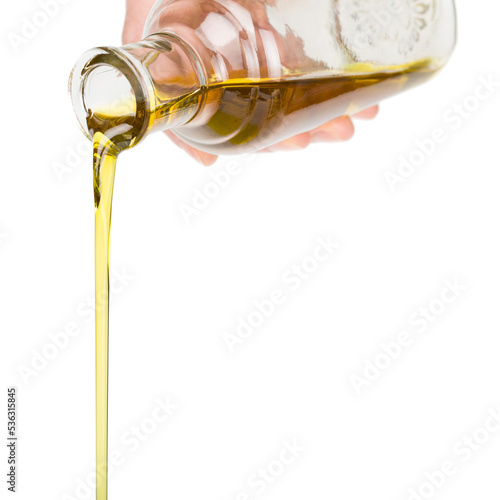 Hand holding bottle with oil pouring, PNG isolated on transparent background  