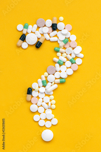 Wallpaper Mural Different tablets, pills, capsules on a yellow background, copy space. The concept of medicine, vitamins and nutritional supplements. Torontodigital.ca