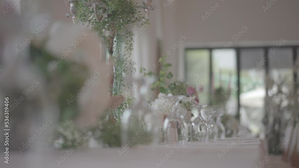 bokeh wine glass with flower at wedding bokeh wine glass with flower at wedding