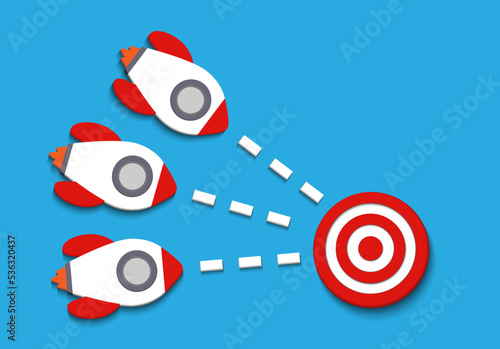 Red three rockets targeting to hit center dartboard. Arrow dart aim goal on bullseye in target. Business success, investment goal, opportunity challenge, aim strategy, achievement focus concept.