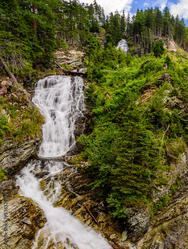 Cascade waterfall on Tauernbach in National Park High Tauern.