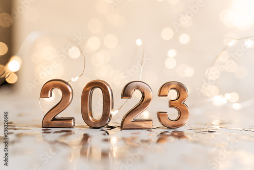 happy new year 2022 background new year holidays card with bright lights,gifts and bottle of hampagne photo