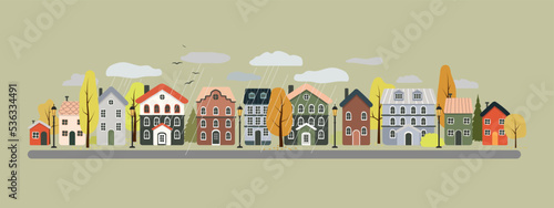 Autumn city. Rainy day in the city. Street with houses. Vector illustration in flat style.
