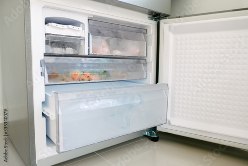 Bottom freezer of the refrigerator with drawer is opened