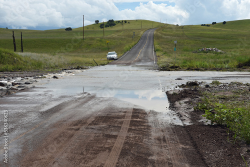 New Mexico Highway near Mule Creek flooded from monsoon rains.
