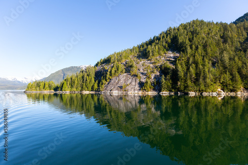 Fototapeta Naklejka Na Ścianę i Meble -  Sunrise on mountains and mirror like reflection in sea water