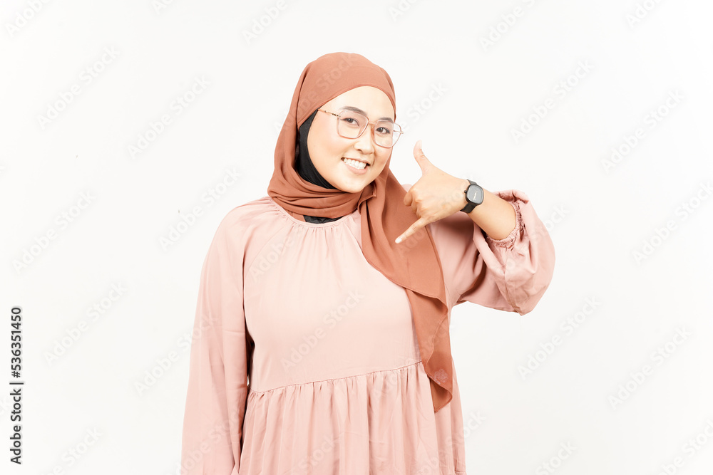 Call me back gesture of Beautiful Asian Woman Wearing Hijab Isolated On White Background Call me back gesture of Beautiful Asian Woman Wearing Hijab Isolated On White Background